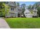 Beautiful home showcasing the manicured lawn and exterior, blending architectural styles at 2362 Browns Mill Rd, Atlanta, GA 30315