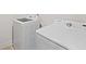 Functional laundry area featuring a modern washing machine and dryer set, creating a convenient space for chores at 2362 Browns Mill Rd, Atlanta, GA 30315