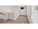 Loft area with carpet, natural light, and neutral wall colors at 2362 Browns Mill Rd, Atlanta, GA 30315