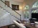 Inviting foyer with staircase, natural light and glass doors gives access to the home at 284 Lakeview Ne Ave, Atlanta, GA 30305