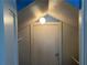 Hallway showing a closet underneath the stairs with white door and walls and a light above at 284 Lakeview Ne Ave, Atlanta, GA 30305
