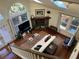 Bright living room with vaulted ceilings, a stone fireplace, and large windows for natural light at 284 Lakeview Ne Ave, Atlanta, GA 30305