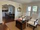 Inviting living room open to the dining area, featuring hardwood floors and large windows at 284 Lakeview Ne Ave, Atlanta, GA 30305