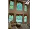 Bright living room with high ceilings, large windows, and comfortable seating at 3008 Sunrise Ct, Conyers, GA 30094