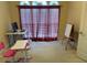 Bright office space featuring two desks, a large window with blinds, and ample natural light at 3008 Sunrise Ct, Conyers, GA 30094