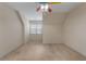 Spacious bedroom with neutral carpet and ceiling fan, offering a bright and airy atmosphere at 340 Antebellum Way, Fayetteville, GA 30215