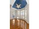 Bright breakfast nook featuring hardwood floors, a blue ceiling, and multiple windows with blinds at 340 Antebellum Way, Fayetteville, GA 30215