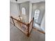 View from above the home's foyer with chandelier and staircase at 340 Antebellum Way, Fayetteville, GA 30215