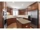Modern kitchen featuring stainless steel appliances, custom cabinets, and a functional center island at 340 Antebellum Way, Fayetteville, GA 30215