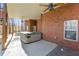 Covered patio with an outdoor spa, perfect for relaxation and entertaining at 340 Antebellum Way, Fayetteville, GA 30215