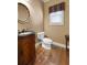 Elegant powder room featuring custom vanity with vessel sink and sophisticated decor at 340 Antebellum Way, Fayetteville, GA 30215