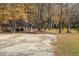 Recreation area with a covered gazebo and a playground set surrounded by tall trees at 340 Antebellum Way, Fayetteville, GA 30215