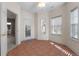 Charming sunroom with tile flooring, a ceiling fan, access to the outside, and plentiful light at 340 Antebellum Way, Fayetteville, GA 30215