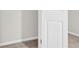 Interior view of carpeted room showing an open door at 156 Club Cir, Stockbridge, GA 30281