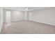 Large bedroom with a walk-in closet and a ceiling fan at 156 Club Cir, Stockbridge, GA 30281