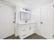 Bathroom with quartz countertop, dark hardware and plenty of storage at 3292 Holly Mill Ct, Marietta, GA 30062