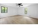 Spacious bedroom with light wood flooring, neutral walls, and plenty of natural light at 3292 Holly Mill Ct, Marietta, GA 30062