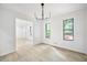 Bright dining area with modern lighting, and scenic outdoor views at 3292 Holly Mill Ct, Marietta, GA 30062