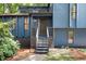 A closer view of the entryway of the blue home, including the front steps and front door at 3292 Holly Mill Ct, Marietta, GA 30062