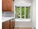 Kitchen area with a large window providing ample sunlight and backyard views at 3292 Holly Mill Ct, Marietta, GA 30062