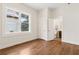 Bright bedroom with hardwood floors, closet, and ensuite bathroom at 4642 Orchid Dr, Pine Lake, GA 30072