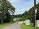 Lovely view of the lake with the walking path nearby at 4642 Orchid Dr, Pine Lake, GA 30072