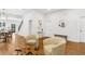 Spacious living room with an open layout, hardwood floors, and neutral decor, perfect for entertaining at 4642 Orchid Dr, Pine Lake, GA 30072