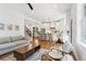 Spacious, open-concept living area with seamless flow into kitchen and staircase, perfect for entertaining at 4642 Orchid Dr, Pine Lake, GA 30072