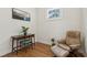 Home office with hardwood floors, window, desk, and leather reclining chair at 4642 Orchid Dr, Pine Lake, GA 30072