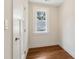 Cozy room with hardwood floors, a bright window, and fresh paint at 4642 Orchid Dr, Pine Lake, GA 30072