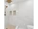 Elegant walk-in shower with marble-like tile and decorative accent tiles at 4642 Orchid Dr, Pine Lake, GA 30072