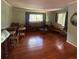 Spacious living room featuring hardwood floors, neutral walls, and natural light at 1164 Rogeretta Ne Dr, Atlanta, GA 30329
