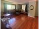Spacious living room featuring hardwood floors, neutral walls, and natural light at 1164 Rogeretta Ne Dr, Atlanta, GA 30329