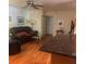 Inviting living room features hardwood floors, a ceiling fan and access to another room at 1164 Rogeretta Ne Dr, Atlanta, GA 30329