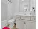 Bathroom featuring vanity with storage and shower with a tub at 425 Eldridge Drive Dr, Suwanee, GA 30024