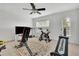 This exercise room is complete with an exercise bike and Total Gym at 425 Eldridge Drive Dr, Suwanee, GA 30024