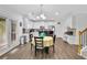 Modern kitchen with stainless steel appliances, white cabinetry, and breakfast nook at 425 Eldridge Drive Dr, Suwanee, GA 30024