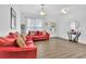 Bright living room featuring hardwood floors, stylish decor, and neutral paint at 425 Eldridge Drive Dr, Suwanee, GA 30024