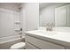 Bathroom featuring a tub, shower, toilet, and vanity at 693 Sunstone Ln, Lawrenceville, GA 30043