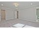 Spacious bedroom featuring neutral walls, plush carpet, and recessed lighting at 693 Sunstone Ln, Lawrenceville, GA 30043