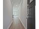 Inviting entryway displaying sleek, modern flooring leading to a bright living area at 693 Sunstone Ln, Lawrenceville, GA 30043
