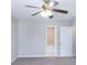 Spacious bedroom with ceiling fan, neutral carpet, and an ensuite bathroom at 1391 Warrenton Hunt, Lawrenceville, GA 30043