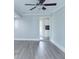 Open living space with neutral paint, new floors, and a glimpse into the modern kitchen at 1391 Warrenton Hunt, Lawrenceville, GA 30043