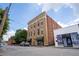 Brick building with green awnings, and street parking at 1596 Cleveland Ave # 301, East Point, GA 30344