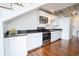 Modern kitchen features white cabinets, stainless steel appliances, and granite countertops at 1596 Cleveland Ave # 301, East Point, GA 30344