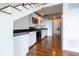 Modern kitchen featuring stainless steel appliances and granite countertops with view of stairs at 1596 Cleveland Ave # 301, East Point, GA 30344