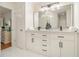 Bright bathroom showcasing double sinks, a large mirror, and a modern vanity at 2057 Cambridge Ave, Atlanta, GA 30337