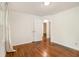 This bedroom boasts gleaming hardwood floors and neutral walls at 2057 Cambridge Ave, Atlanta, GA 30337