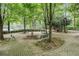 Peaceful park with benches, trees, and brick walkways creating an inviting outdoor space for relaxation and community enjoyment at 2057 Cambridge Ave, Atlanta, GA 30337