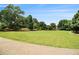 Lush green park area with pathway at 2057 Cambridge Ave, Atlanta, GA 30337